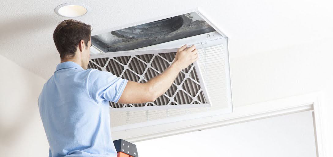Person Changing Out A Fancy Air Filter At Home