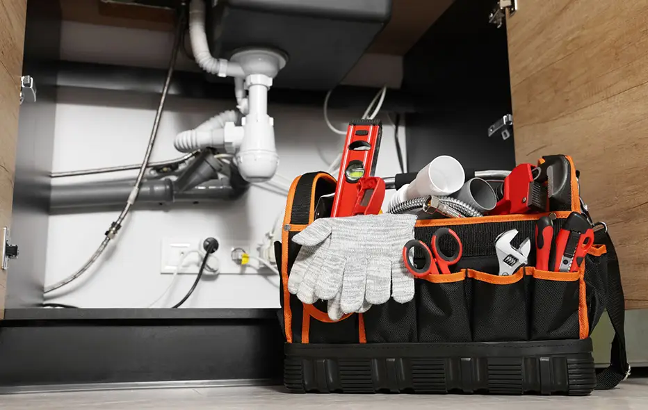 Plumbing under a sink